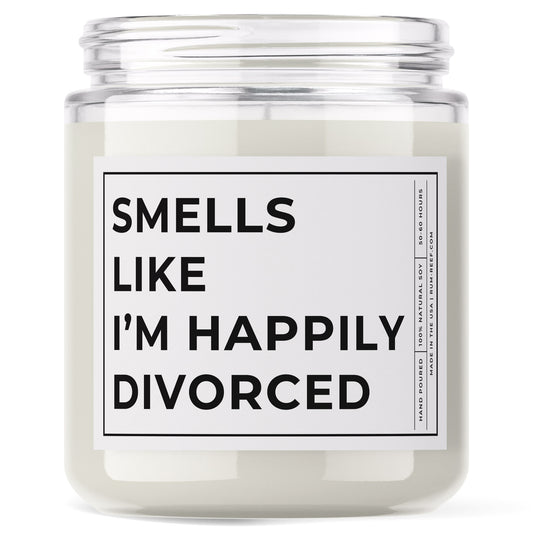 Smells Like I'm Happily Divorced 9oz Candle. The text is printed with big bold words.