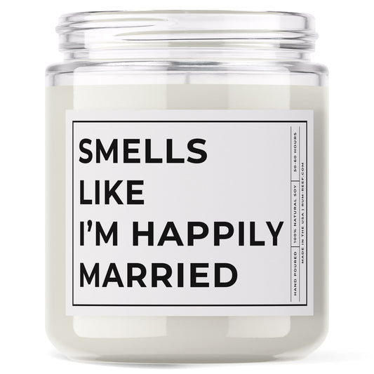 Smells Like I'm Happily Married 9oz Candle. The text is printed with big bold words.